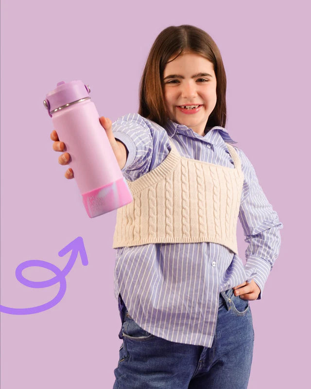 Child holding a pink water bottle against a purple background
