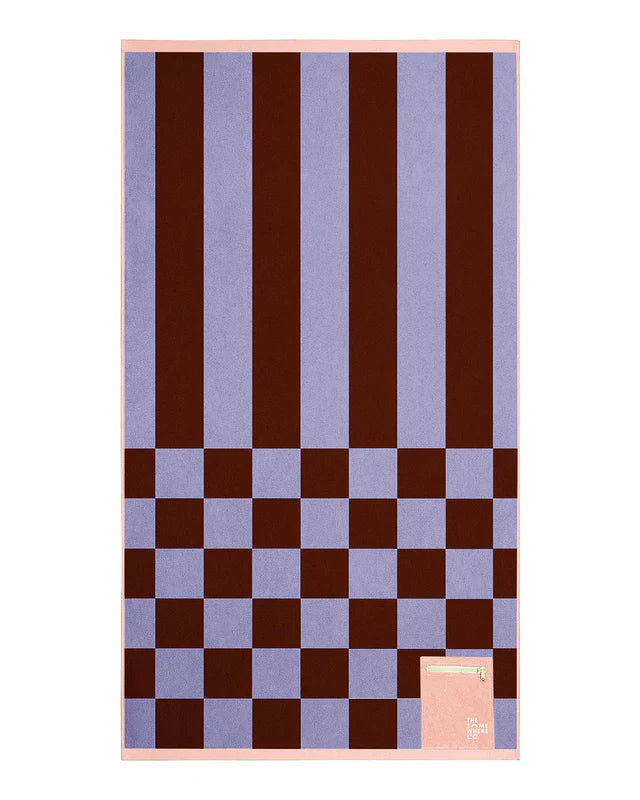 Checkered towel with brown and purple stripes on a white background