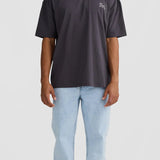 Person wearing a dark gray t-shirt and light blue jeans on a white background