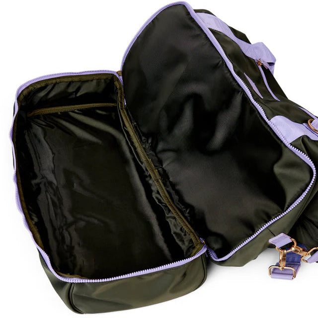 Green bag with open compartments on a white background