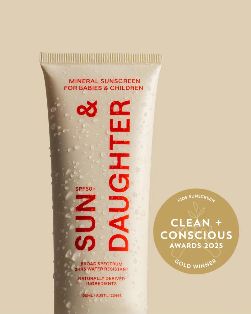 Sunscreen tube for babies and children with 'Sun & Daughter' branding on a beige background