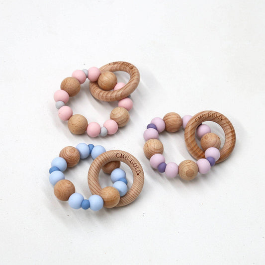 CMC Gold - Two-Toned Silicone Teether With Beech Wood Ring: Blue Green