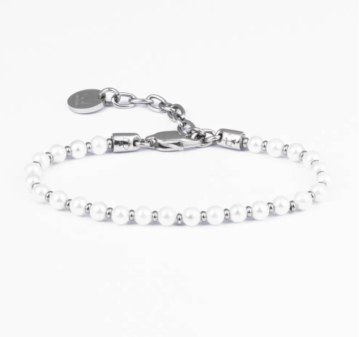 Silver bracelet with small pearls on a white background