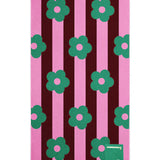 Towel with green floral patterns on pink and brown striped background