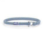 Blue and white braided dog collar on a white background