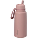 Pink water bottle with a straw lid on a white background