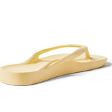 Yellow sandal on a white background