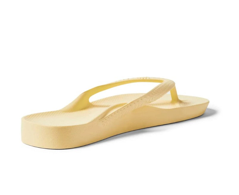 Yellow sandal on a white background
