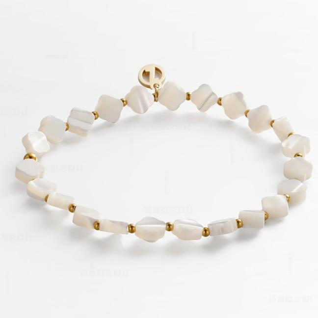 A beaded stretch bracelet featuring irregular white mother-of-pearl beads and small gold spacer beads, with a gold clasp, displayed on a clean white background.