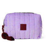 Purple quilted bag with a red tag on a white background