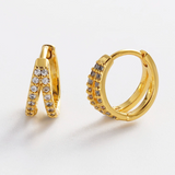 gold huggie earring with crystal details