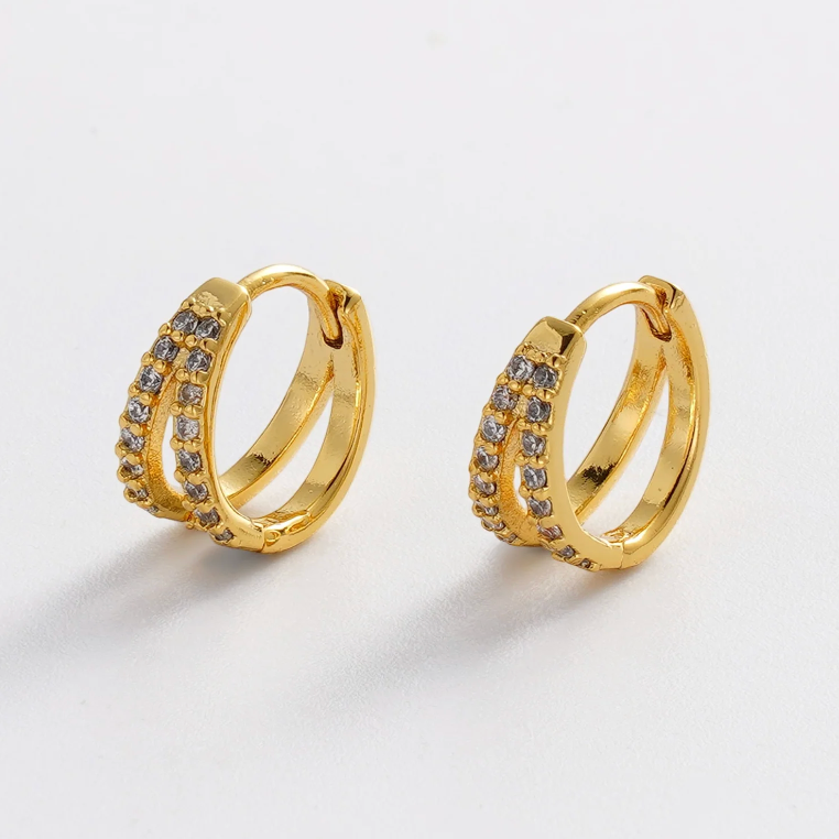 Gold hoop earrings with embedded stones 