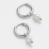 silver hoop earring with small pearl huggie