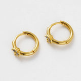 Small gold hoop earring with crystal detail