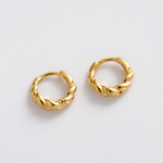 Pair of gold hoop earrings small textured