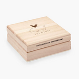 Wooden box with 'Pig & Hen' branding and 'Handmade in Amsterdam' text on a white background
