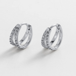 Pair of silver hoop earrings with embedded stones huggie hoop style